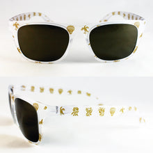 Cargar imagen en el visor de la galería, Vista frontal y lateral de las gafas de sol falleras semitransparentes con pardalets y detalles dorados.